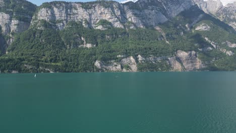 Majestic-Alpine-rugged-mountainous-backdrop-over-Switzerland-clam-lake