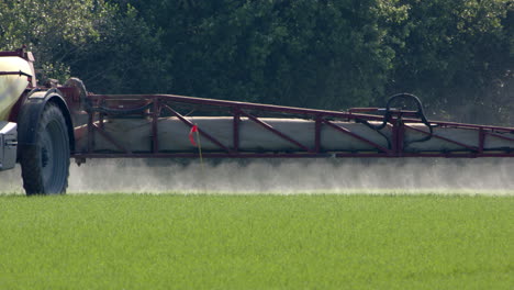 Toxic-pesticides-sprayed-on-crops-cultivated-on-farm-land,-global-food-security