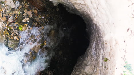 Drone-flight-exits-tunnel-beneath-avalanche-covered-Provo-Canyon-during-thaw