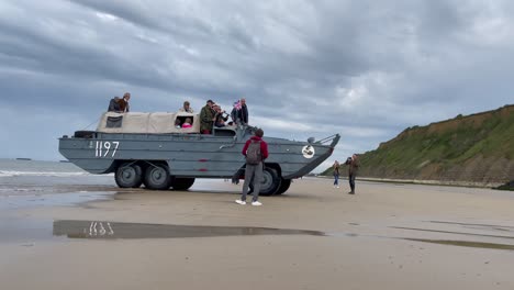 World-War-II-amphibious-American-vehicle-drives-out-of-the-sea-in-Normandy