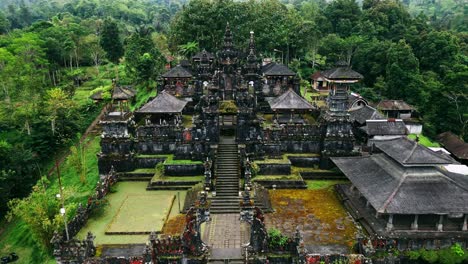 Nestled-amidst-the-stunning-landscapes-of-Bali,-the-Besakih-Temple-reigns-as-a-majestic-symbol-of-spirituality-and-cultural-reverence