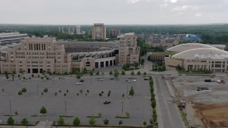 University-of-Notre-Dame-campus-and-Notre-Dame-Stadium-in-South-Bend,-Indiana-with-drone-video-moving-left-to-right-parallax