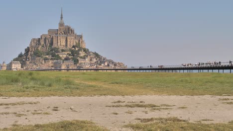 View-of-the-bridge-to-the-medieval-abbey-of-Mont-Saint-Michel-in-France