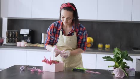 Packaging-of-home-made-desserts,-decorating-with-flowers