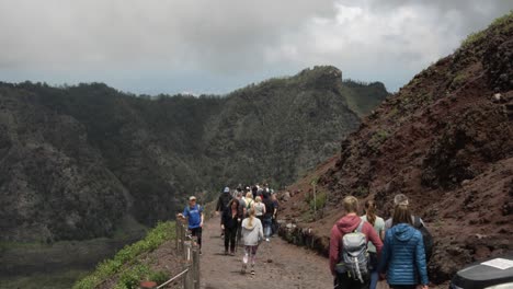Tourists-And-Hikers-Walking-Along-Path-To-Summit-Of-Mount-Vesuvius-In-Naples,-Italy