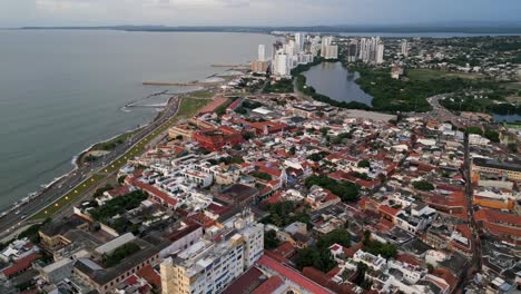 Panoramic-aerial-view-of-port-city-Cartagena-and-scenic-drive-through-Caribbean-coast,-Colombia