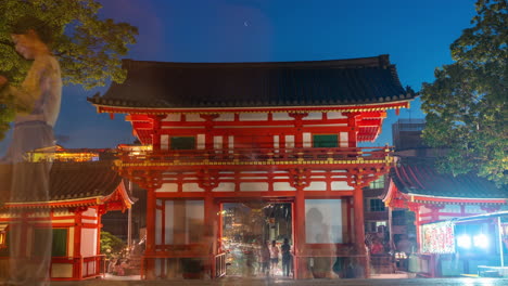 Yasaka-Jinja-shrine-temple-buddhist-at-Kyoto-Japan-time-lapse-night-street-view-from-tory-entrance-city-traffic-light