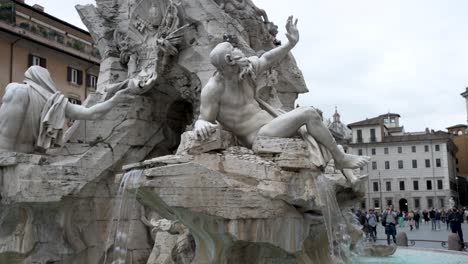 Marble-Statues-At-Fountain-Of-The-Four-Rivers-In-Piazza-Navona-In-Rome