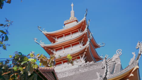 Capture-the-stunning-view-of-a-pagoda's-architectural-beauty-set-against-a-backdrop-of-clear-blue-sky