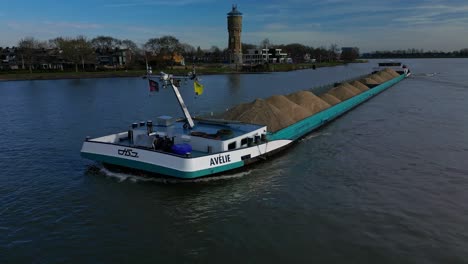 Aerial-View-Of-Avelie-Inland-Motor-Freigher-Transporting-Sand-Along-Oude-Maas