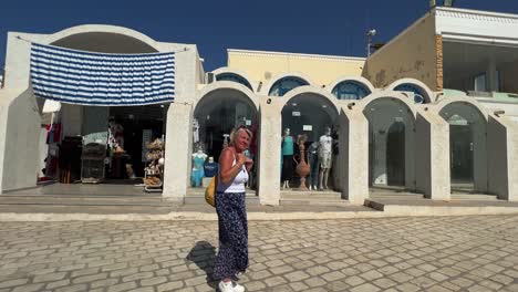 Panning-view-of-traditional-market-of-Houmt-Souk-of-Djerba-island-in-Tunisia