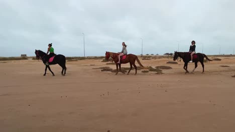 Tourists-riding-horses-and-having-fun-in-Djerba-salt-lake-dry-desert-in-Tunisia