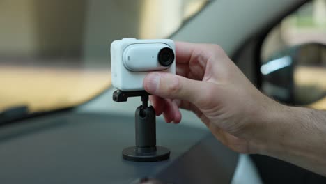 Attaching-Insta360-GO-3-Action-Camera-To-Quick-Release-Mount-On-Car-Dashboard