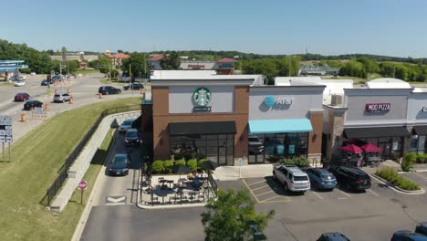 Aerial-Establishing-Shot-of-Starbucks-Coffee-Shop-in-United-States-Suburb