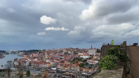 Porto,-Portugal-from-above-overlooking-Dom-Luis-1-bridge,-Douro-river-and-Porto-city