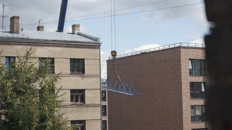 10-July-2023,-Riga,-Latvia:-Workers-Seting-Up-Crane-in-Big-Hight