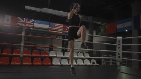 Fit-female-boxer-training-in-a-boxing-hall