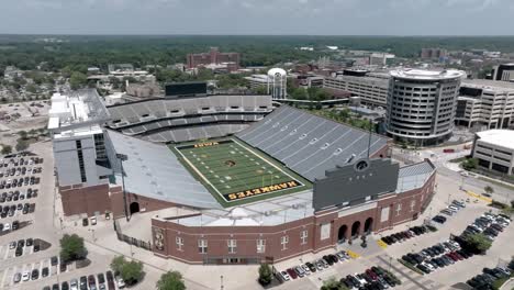 Kinnick-stadium-on-the-campus-of-the-University-of-Iowa,-home-of-the-Iowa-Hawkeyes-in-Iowa-City,-Iowa-with-drone-video-in-circle