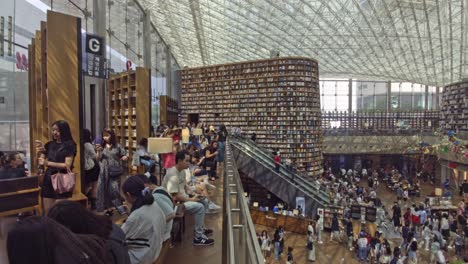 Wide-shot-with-slow-movement-of-crowds-and-books
