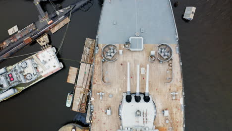 Top-down-view-of-the-USS-Massachusetts,-a-World-War-II-battleship-docked-in-Fall-River