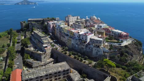 Medieval-Church,-Museum-and-Monastery-of-Procida-Islands-at-Procida-Island-surrounded-by-salt-seawater,-Italy,-Aerial-Shot