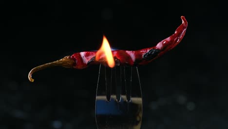 A-burning-hot-red-chili-pepper-on-a-fork