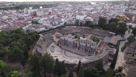 Iconic-roman-theater,-dense-Spanish-city-of-Merida-in-background