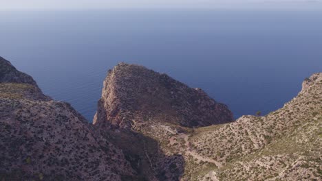 Amazing-viewpoint-Mirador-Mallorca-Spain-with-high-cliffs-during-day-time,-aerial