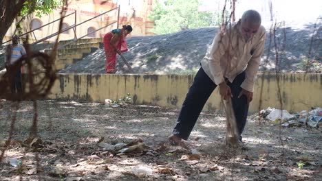 NGO-workers-are-removing-the-accumulated-garbage-and-plastic-waste-and-cleaning-the-site