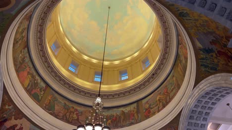 Panning-across-from-right-to-left-looking-up-at-hand-panted-murals-on-the-Utah-State-capital-ceiling