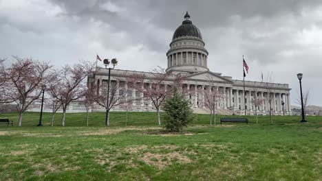 Moving-up-hill-while-looking-at-front-of-Utah-State-Capital-on-an-overcast-spring-day