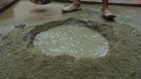 poor-working-condition-in-indian-construction-site-barefoot-labor-close-up