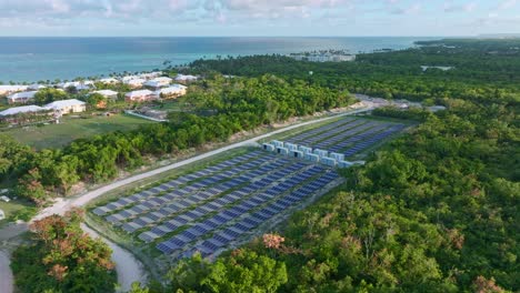 Solar-panels-near-coast-powering-hotels-of-Punta-Cana,-Dominican-Republic
