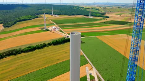 Tower-Of-Windmill-Under-Construction-In-Austria---aerial-shot