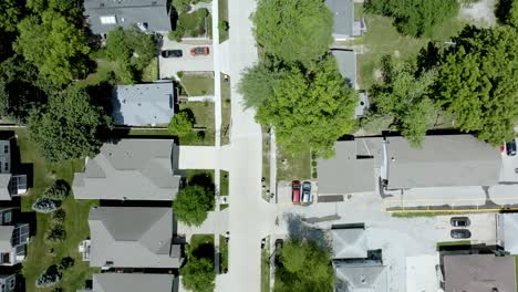 Iowa-City,-Iowa-neighborhood-with-drone-video-overhead-looking-down-and-moving-forward
