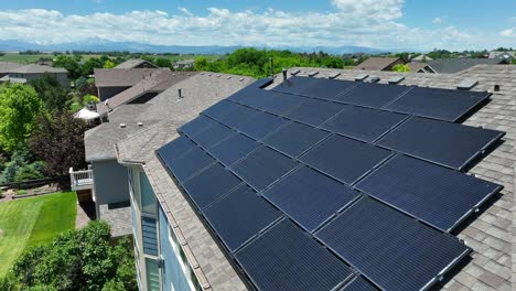 Solar-panels-on-upscale-home-on-summer-day