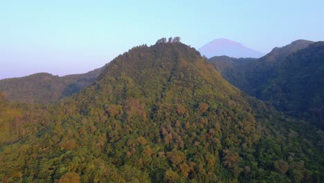 Steep-hillsides-covered-in-dense-forest,-Indonesia