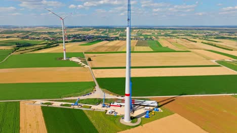 Wind-Turbine-Under-Construction-In-Austria---aerial-drone-shot