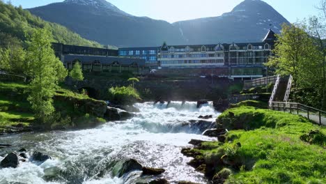 Famous-Hotel-Union,-Geiranger,-overlooking-river-waterfall-near-Geiranger-Fjord