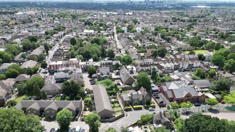 Hi-angle-panning-shot-Walthamstow-East-London-UK-streets-and-houses-drone,-aerial
