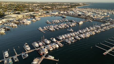 Aerial-view-over-the-piers-and-yachts-of-Fremantle-Sailing-Club-in-Perth,-Western-Australia