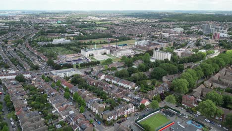 Walthamstow-East-London-UK-streets-and-houses-drone,-aerial-town-hall-in-background