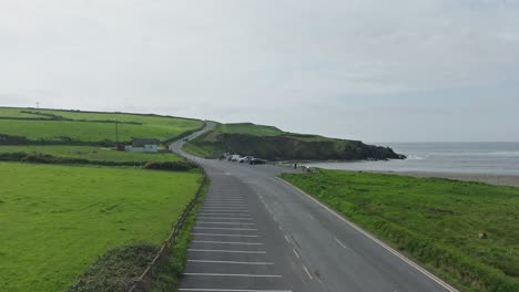 Vintage-cars-on-a-rally-at-Kilmurrin-Cove-Copper-Coast-Waterford-Ireland-on-a-summer-morning