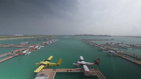 Tropical-seaplane-airport-with-floating-dock-in-Indian-Ocean,-Maldives