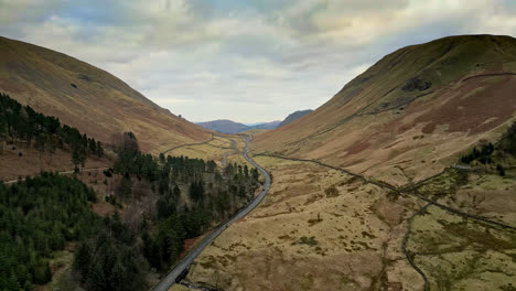 Experience-the-grandeur-of-the-Cumbrian-landscape-through-captivating-drone-footage,-revealing-Thirlmere-Lake-embraced-by-majestic-mountains