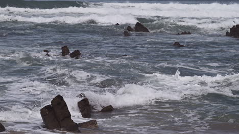 Breaking-waves-on-rocks-at-the-North-Atlantic-coast-of-Portugal-in-slowmotion