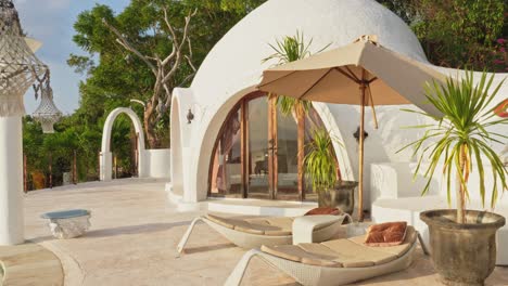Uniquely-designed-tiny-dome-villa-with-tropical-garden