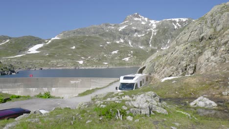 Small-car-park-by-a-lake-in-the-Swiss-Alps