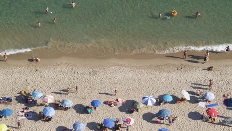 Crowded-Mediterranean-beach-from-above-4K