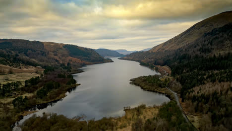 Experience-the-enchanting-allure-of-the-Cumbrian-landscape-in-a-captivating-aerial-video,-featuring-Thirlmere-Lake-embraced-by-majestic-mountains